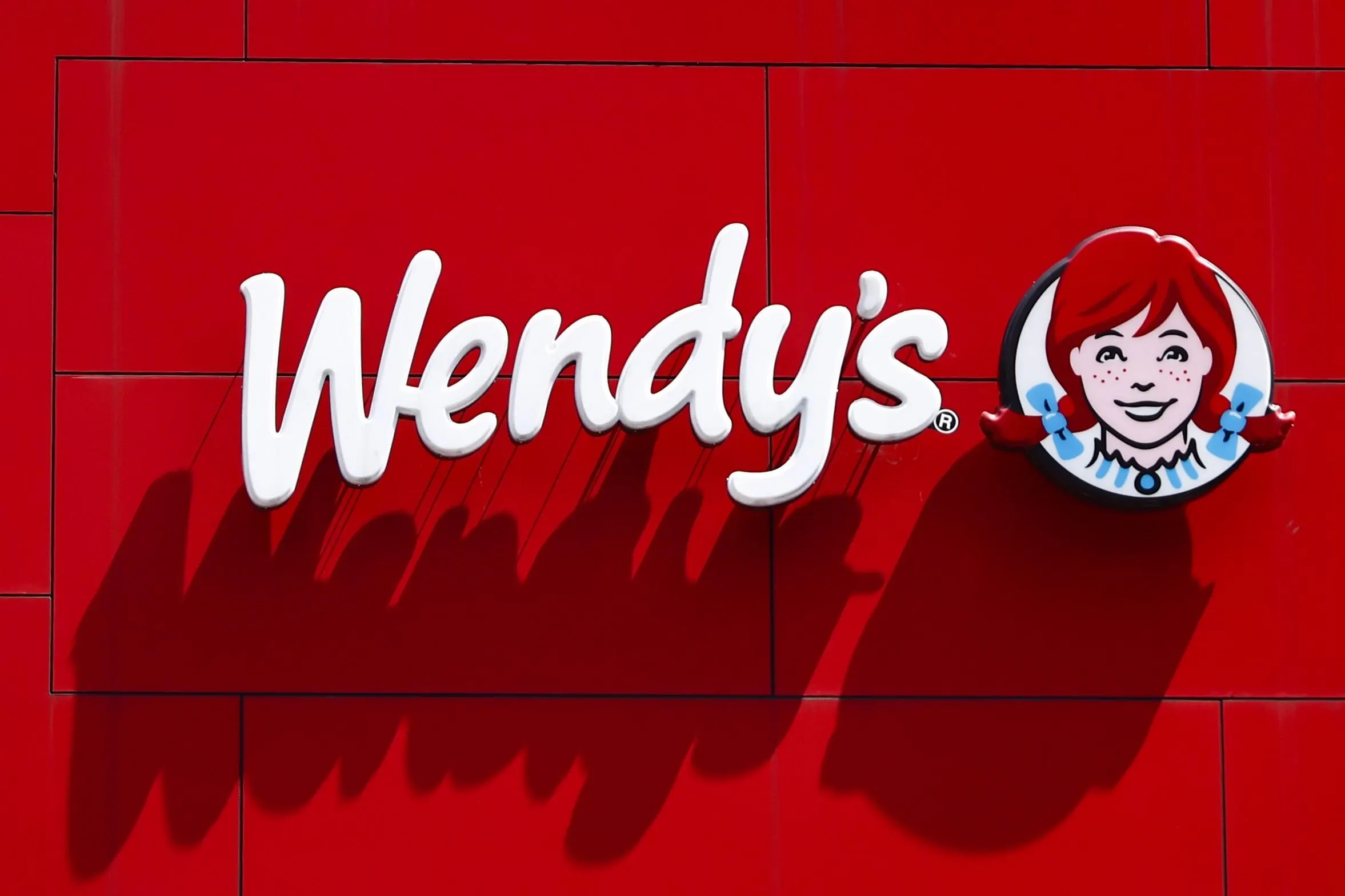 Dividend Reduction As A Business Model Signal: Wendy's Strategic Repositioning
